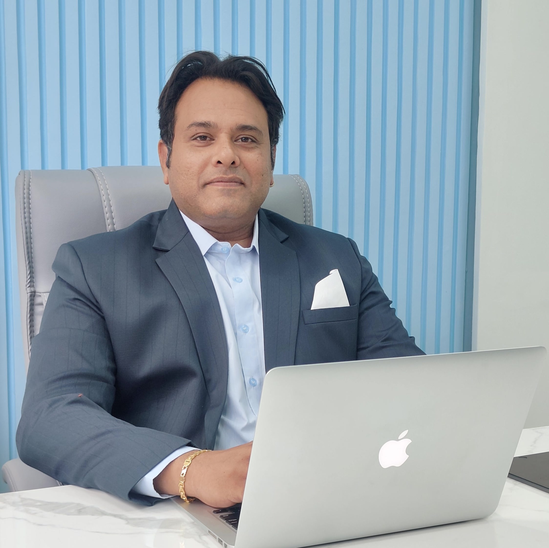 Saurabh Aneja, Founder of InterioArty, at his desk